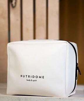 Nutridome spacious cosmetic bag made of artificial leather